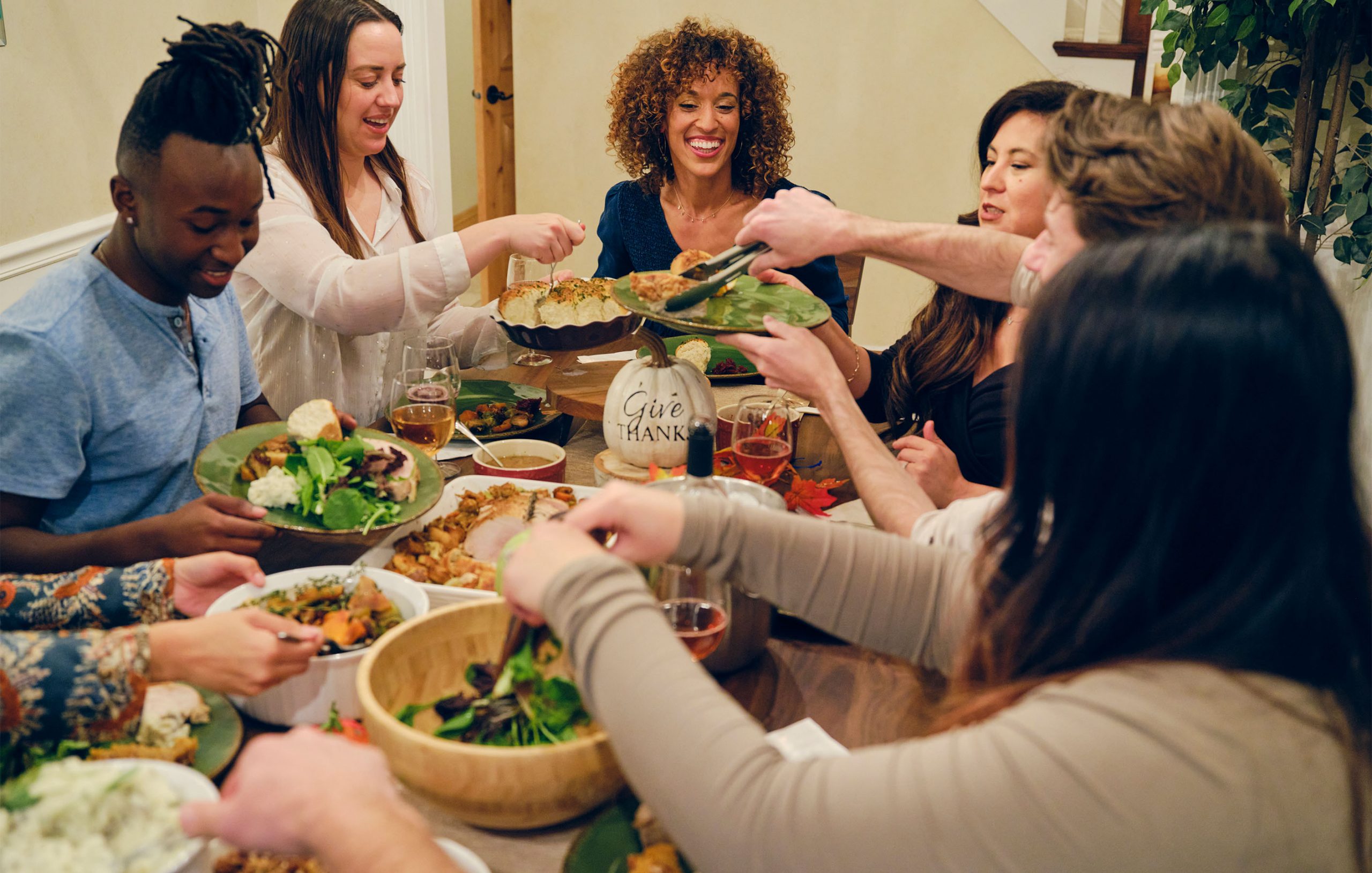 People sitting around a table eating